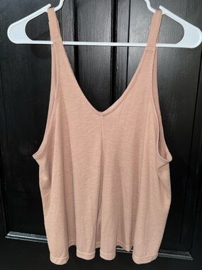 Free People V-Neck Ribbed Tank Top - Blush Orange. Loose fit.